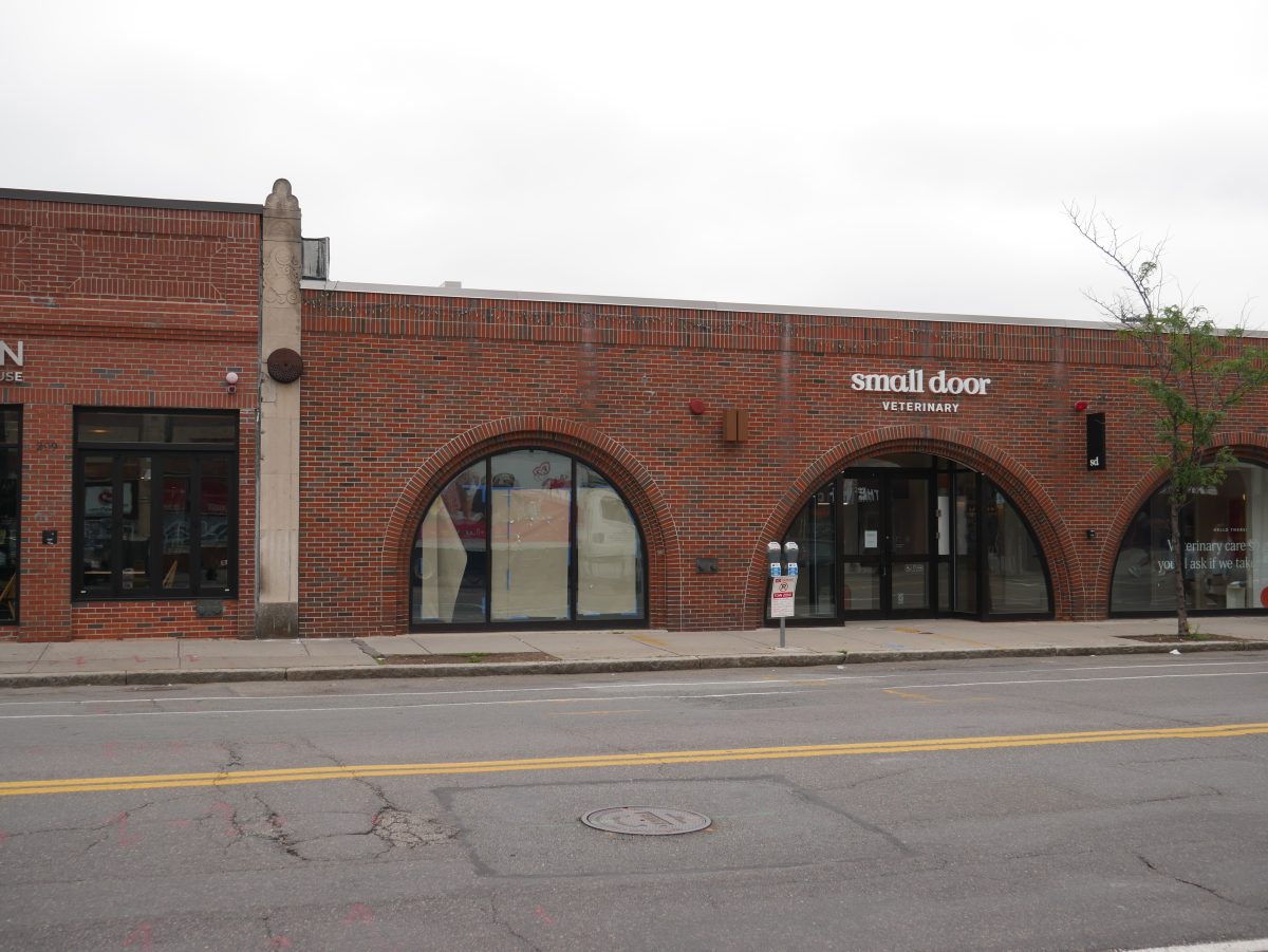 A brick building located at 297 Harvard Street in Brookline.